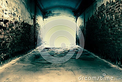 Abstract horror scary background, mysterious strange light at the end of a dark corridor tunnel with mystical shadows on Stock Photo