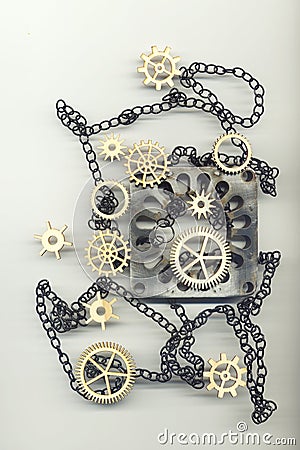 Abstract image with gears, chain and a metal object Stock Photo