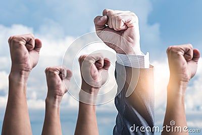 The abstract image of the hands rising up to the sky. Stock Photo