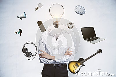 Abstract image of headless businesswoman with idea head, laptop, guitar and other items flying around on concrete wall background Editorial Stock Photo