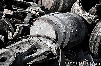 Abstract image with old wooden barrels of alcohol and wheels from the cart Stock Photo