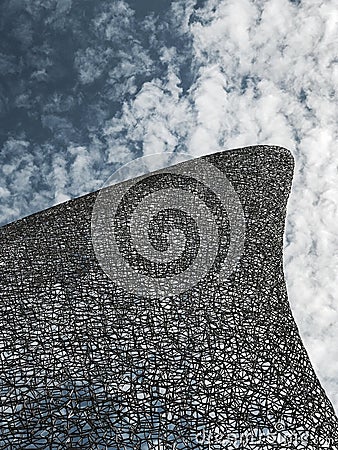 Abstract image of a sculpture against the textured sky Editorial Stock Photo