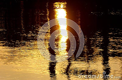 Abstract image of sunset lighting reflecting off of water Stock Photo
