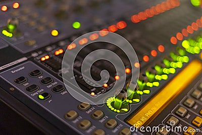 abstract image of technical audio desk blurred with multiple strong colors. Stock Photo