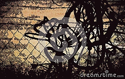 ABSTRACT JUMBLE OF WIRE AGAINST A FENCE Stock Photo