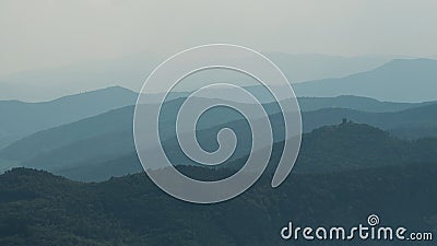 Abstract Landscape with Silhouettes of Misty Mountains Stock Photo