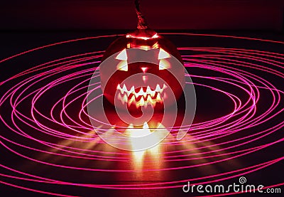 Lightpainting around halloween pumpkin Stock Photo