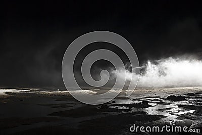 Abstract mars like terrain, muddy puddles of water textures, rocks, heavy fog Stock Photo