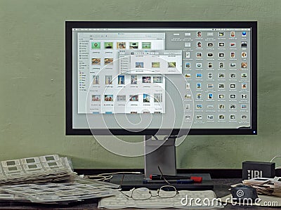 Abstract Messy workplace of Photographer at home showing Monitor Lokgram Kalyan Editorial Stock Photo