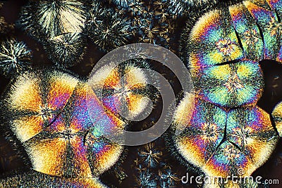 Abstract micrograph of colorful rounded stacks of lysine crystal Stock Photo