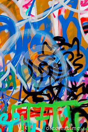 Abstract modern street art graffiti with smiley closeup. Urban contemporary iconic culture of youth. Stock Photo