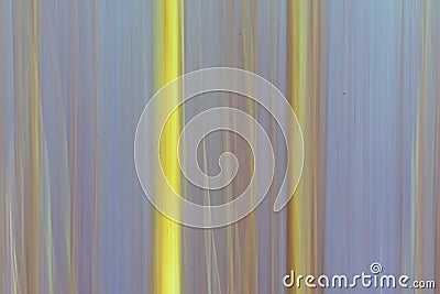 Abstract motion blur background in soft yellow and blue with vertical lines Stock Photo
