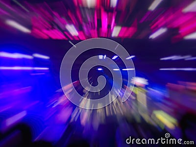 Abstract motion blur effect. Bokeh lighting in concert with audience Stock Photo