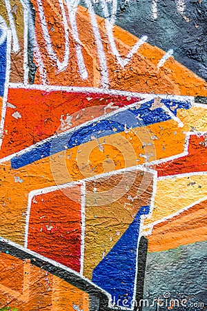 Abstract multicolored graffiti drawings. Wall painting orange and blue. Beautiful design for wallpaper and decoration Stock Photo