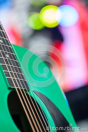 Abstract music background with green guitar Stock Photo