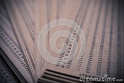 Abstract numbers printed on old brown paper macro shot Stock Photo