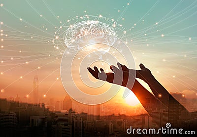 Abstract palm hands touching brain with network connections Stock Photo