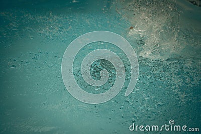 Abstract photo lifestyle, nature background. Unrecognizable person body deep under water, look at surface. Mystery mood Stock Photo