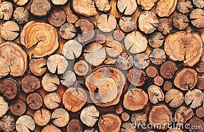 Abstract photo of a pile of natural wooden logs background Stock Photo