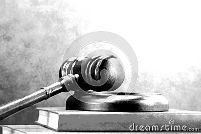 Abstract photo with wooden gavel and book with codes Stock Photo