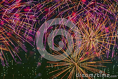 Abstract picturesque firework with multicolored glowing sparks. Bright holiday background Stock Photo