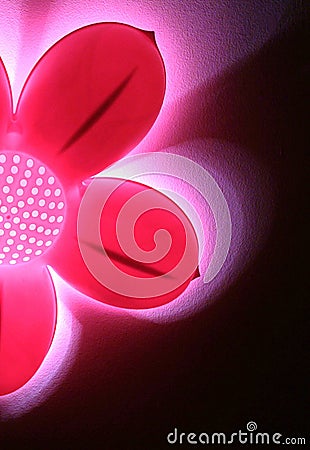 Abstract pink flower light against black backgroun Stock Photo