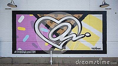 Abstract public art mural by Tex Moton outside Sugar Bee Sweets Bakery in Arlington, Texas. Editorial Stock Photo