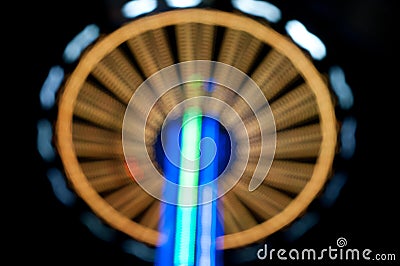 Abstract random colourful defocused blurred night life of fun fair background pattern Stock Photo