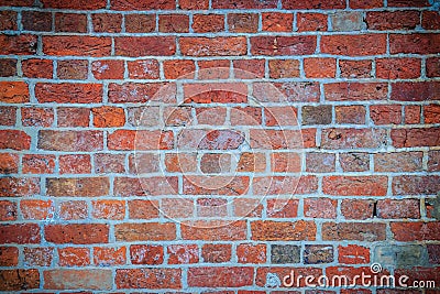 Abstract red brick old wall texture background. Ruins uneven crumbling red brick wall background texture. Stock Photo