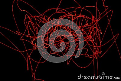 Abstract red lines drawn by light on a black background Stock Photo
