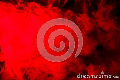 Abstract red-orange smoke hookah on a black background. Stock Photo