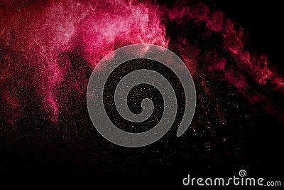 Abstract red powder explosion on black background. Stock Photo