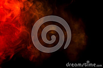 Abstract red and yellow smoke hookah on a black background. Stock Photo