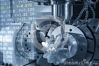 The abstract scene of 5-axis CNC milling machine and G-code data cutting the metal gear parts by solid ball endmill tools. Stock Photo