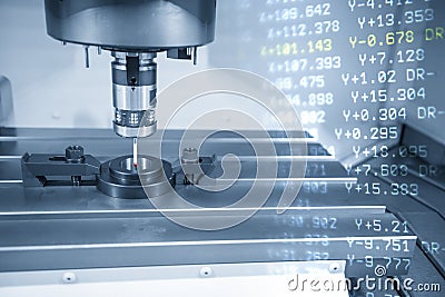 The abstract scene of touching probe attache the CNC milling machine measure dimension of ring gauge parts for calibration proce Stock Photo