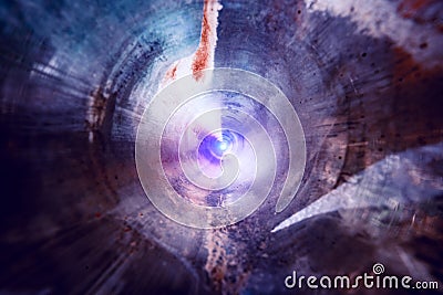 Abstract shining blue and purple circle tunnel background A light in the end of a tunnel Stock Photo