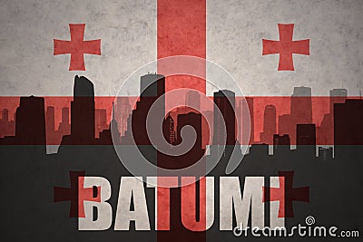 Abstract silhouette of the city with text Batumi at the vintage georgian flag Stock Photo