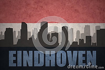 Abstract silhouette of the city with text Eindhoven at the vintage dutch flag Stock Photo