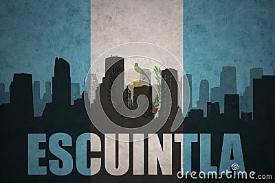 Abstract silhouette of the city with text Escuintla at the vintage guatemalan flag Stock Photo