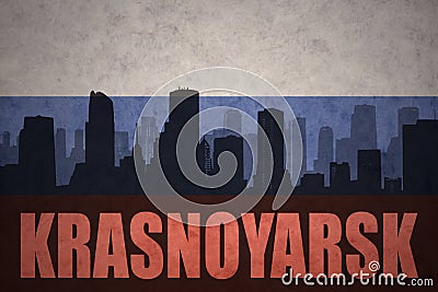 Abstract silhouette of the city with text Krasnoyarsk at the vintage russian flag Stock Photo