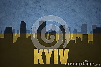 Abstract silhouette of the city with text Kyiv at the vintage ukrainian flag Stock Photo