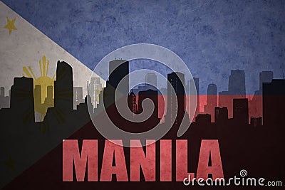 Abstract silhouette of the city with text manila at the vintage philippines flag Stock Photo