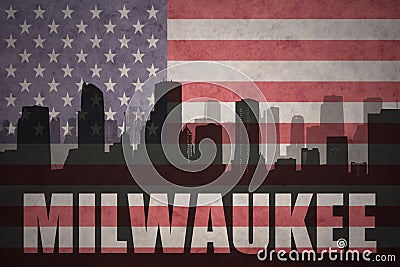 Abstract silhouette of the city with text Milwaukee at the vintage american flag Stock Photo