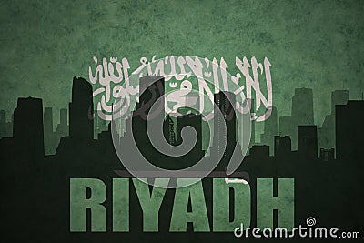 Abstract silhouette of the city with text Riyadh at the vintage saudi arabia flag Stock Photo