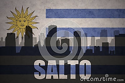 Abstract silhouette of the city with text Salto at the vintage uruguayan flag Stock Photo