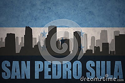 Abstract silhouette of the city with text San Pedro Sula at the vintage honduras flag Stock Photo