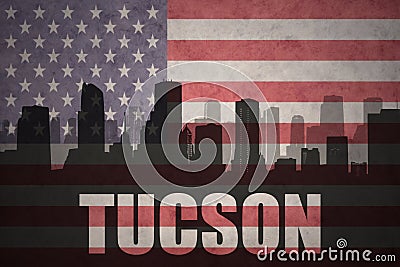 Abstract silhouette of the city with text Tucson at the vintage american flag Stock Photo