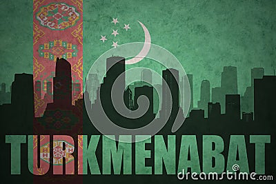 Abstract silhouette of the city with text Turkmenabat at the vintage turkmenistan flag Stock Photo