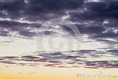 Abstract soft blurred colored beautiful sunset, yellow, pink and purple clouds, evening sky. Natural background Stock Photo