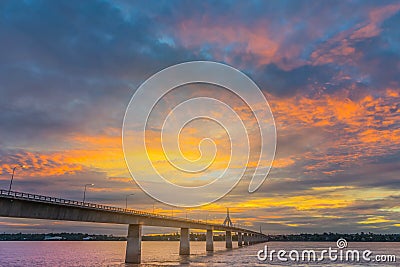 Abstract soft blurred and soft focus silhouette sunrise with the beautiful sky in the morning at Thailand, Laos friendship bridge Stock Photo